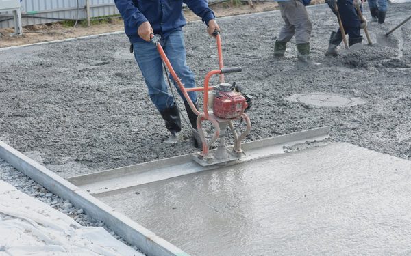Freshly poured and screeded concrete slab with the surface still wet